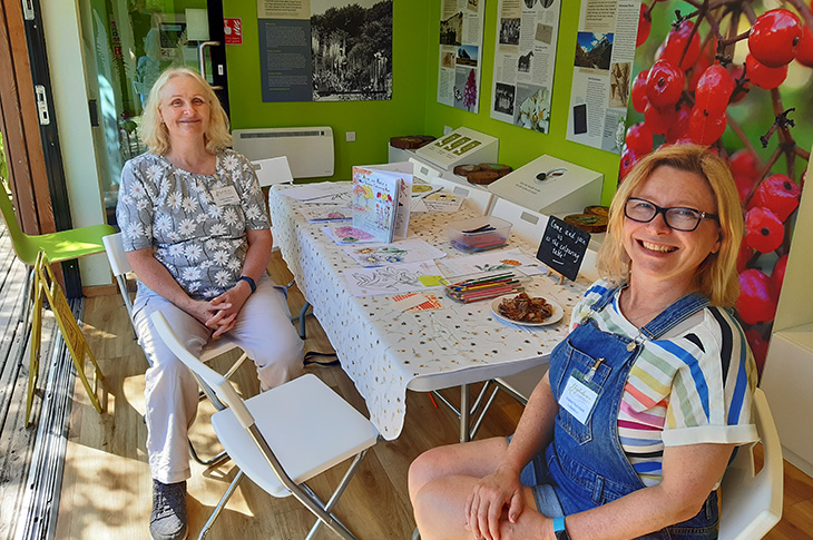 Anita (left) with Rebecca (right) in the Highdown Visitor Centre volunteering at a Highdown Discover Day